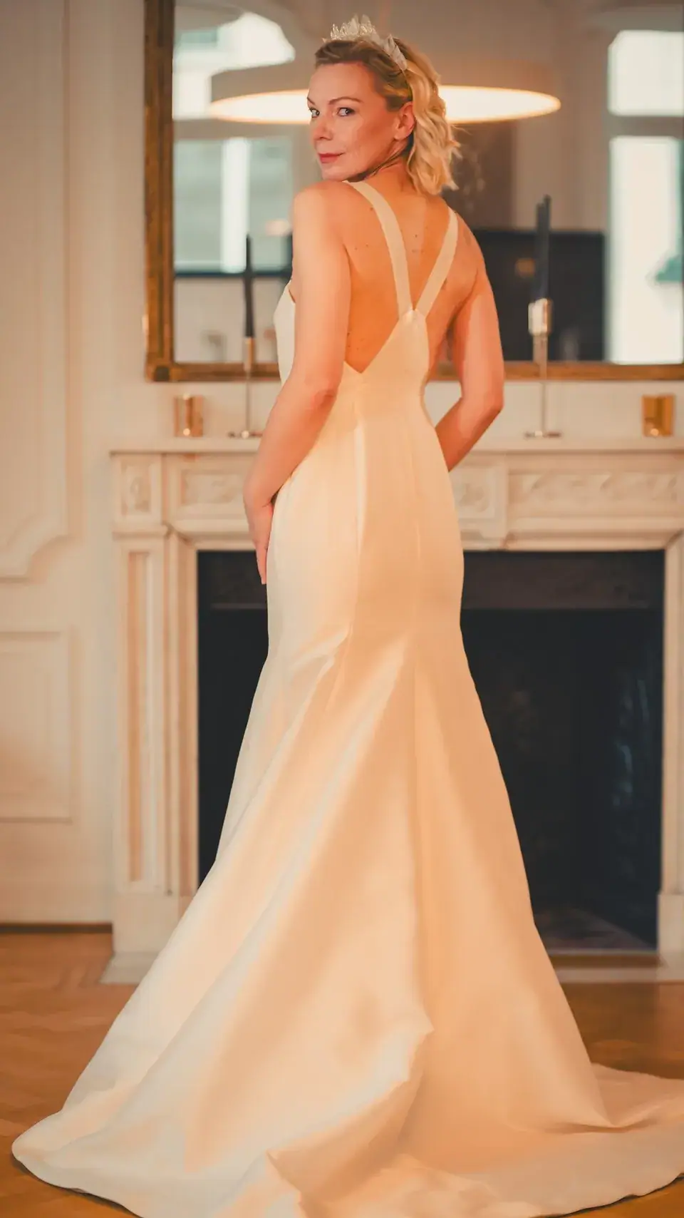 Bride wearing a handmade Italian wedding dress at La Rosa Bianca bridal boutique in Brussels